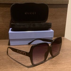 Gucci Black Sunglasses with Gold Accents